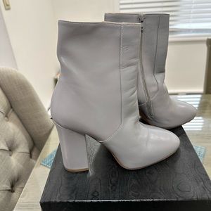 Gray Leather Ankle Boot. Worn Only Once . Purchased New. Niche back left heel .
